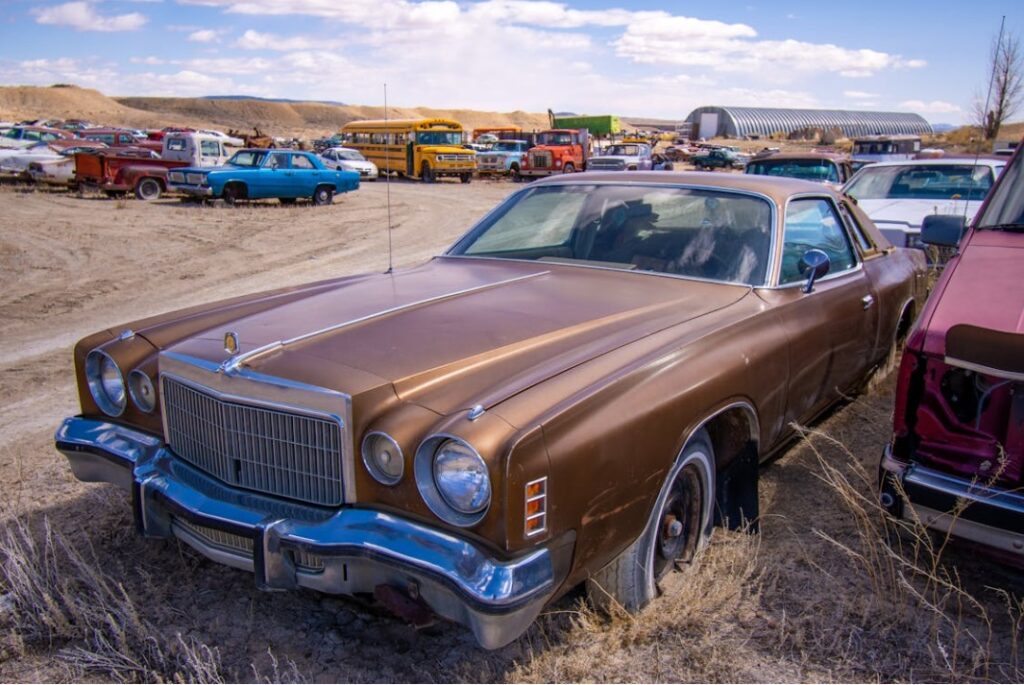 family muscle car in scrap yard