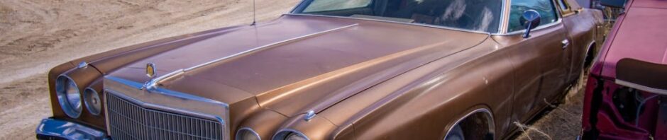 family muscle car in scrap yard